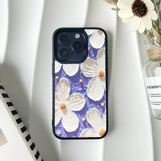Phone case featuring a faux-textured 3D impasto painting design of large white flowers on a textured purple background.